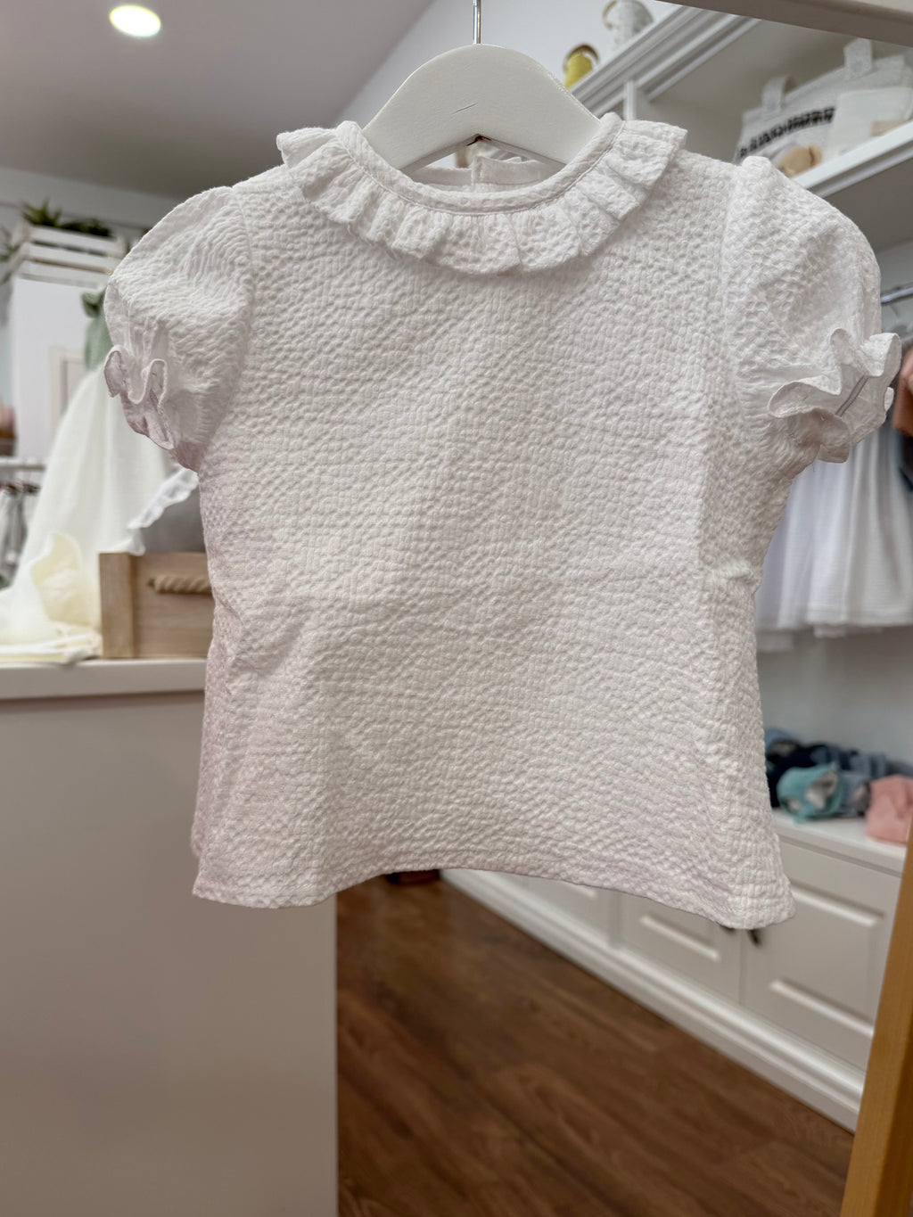 Blusa cuello volante