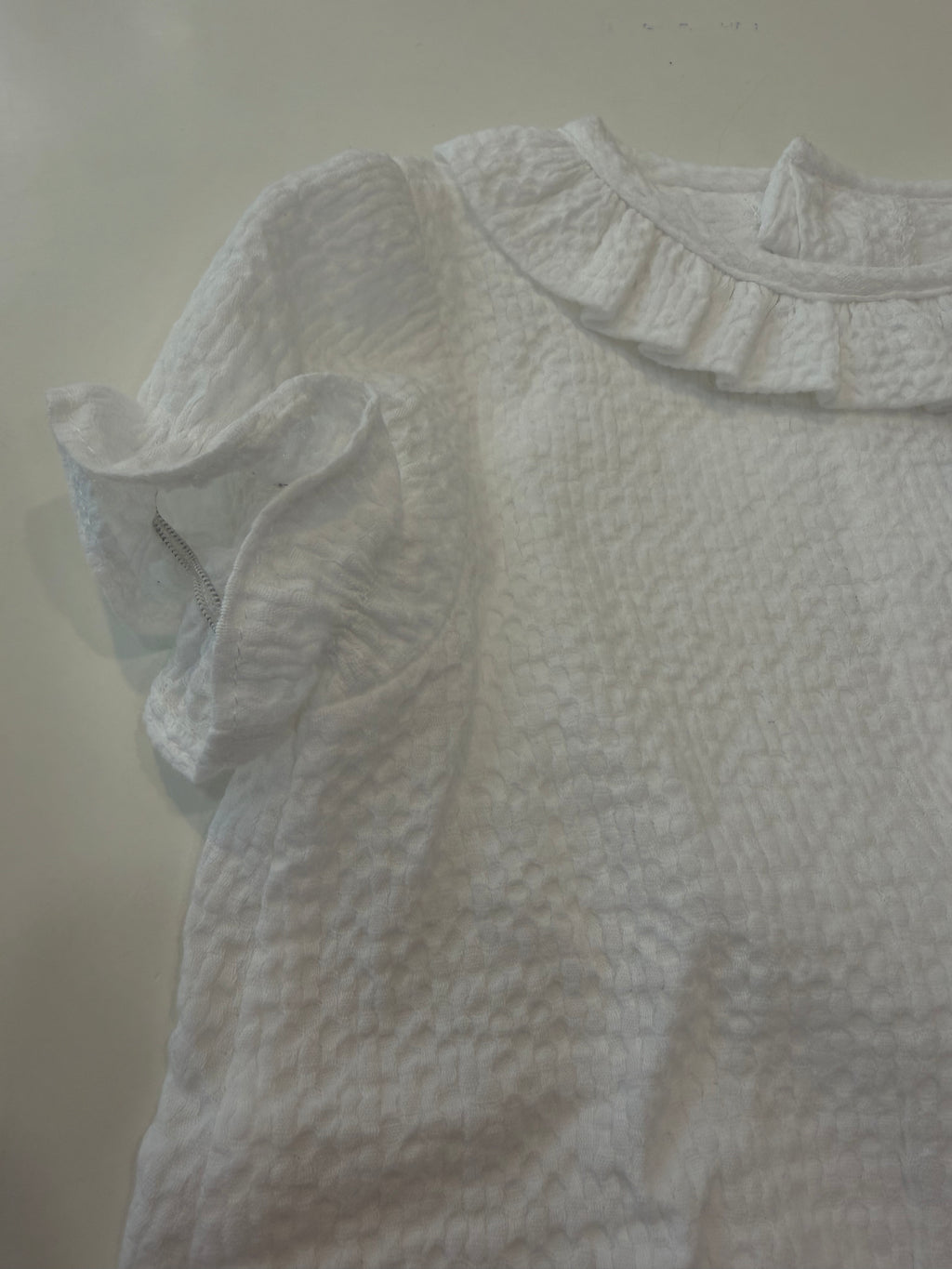 Blusa cuello volante