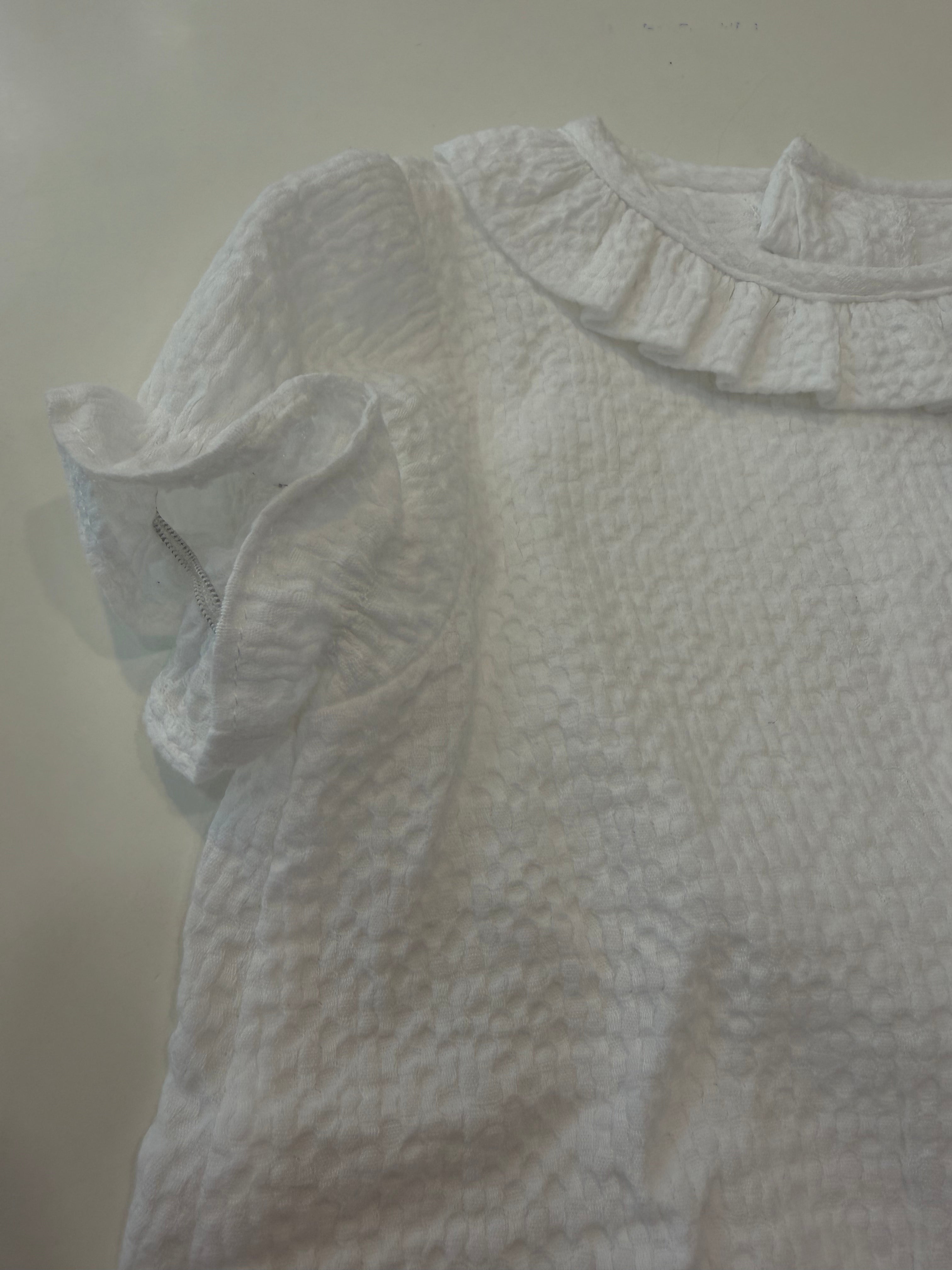 Blusa cuello volante