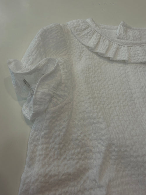 Blusa cuello volante